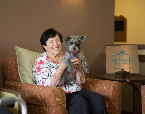 Pet Therapy is enjoyed at St. Paul's Plaza.