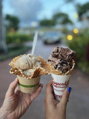 Kona coffee & nene tracks on the left in a waffle cup  Oreo in a waffle come on the right. Both double scoops