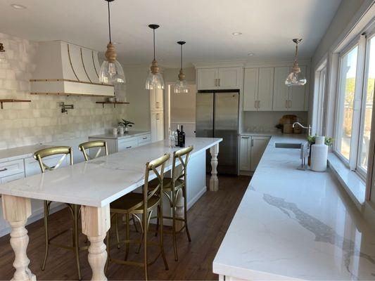 Kitchen counters and tile backsplash.