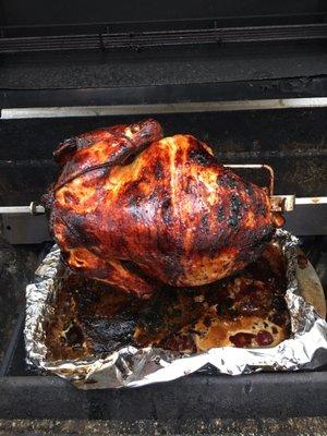 Turkey  on the rotisserie! Marinated in 50/50 Mescal and Apple  Cider, stuffed with crushed pineapple for Christmas Eve!