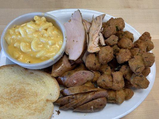 Two meat plate with turkey and jalapeño sausage. Okra was great