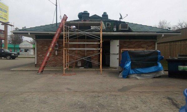 The back door, wide-open while work takes place on the leaks. The dough doesn't sit too far from that door.