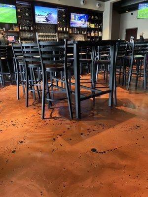 The bar area seating. Love the floor pattern!