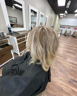 From Platinum blonde heavy highlights to a soft blonde with dimension.
 -Hair by Michelle