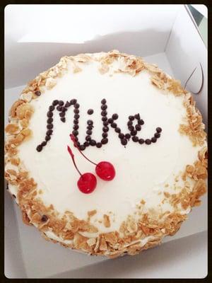 The birthday cake they made for my husband. A DELICIOUS cannoli cake with amaretto soaked cherries and my husband's name in CC.