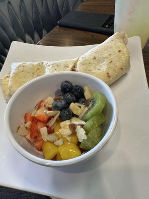 My husbands chorizo burrito and fresh fruit!