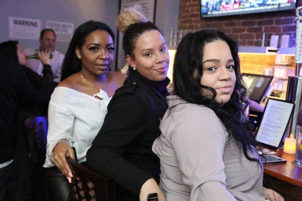 The lovely ladies at the bar.