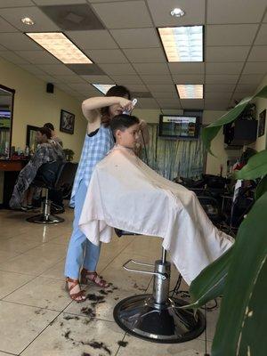 My baby getting his back to school haircut!