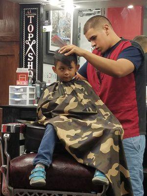 Getting his big boy haircut with Angel!