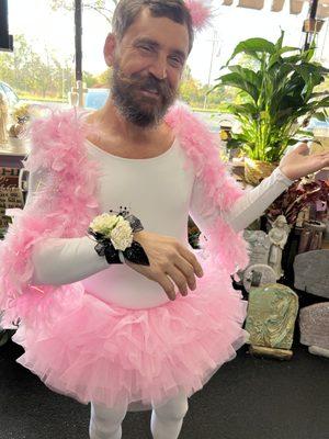 Mitch rocking the pink tutu and this glittery corsage like it was meant for him. That wrist looks a little too limp for comfort!