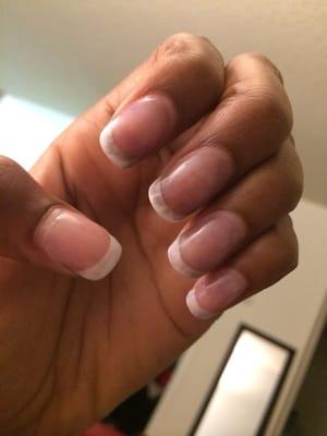 This is what happens when you get a gel top coat on your pink & white acrylics! What the heck?!!! overpriced and disappointing!