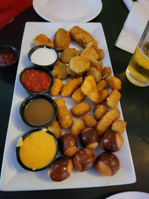 Sampler with Poppers, Fried Pickle Chips, Cheese Curds, and Buckeye Bites, Ranch, Marinara, Caramel sauce, Beer Cheese.