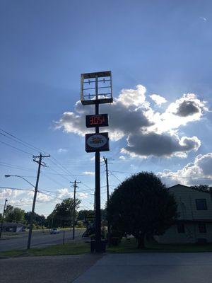 The wind blew out their topmost sign, but at least the fuel price sign is still functioning.