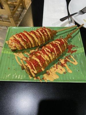 Korean corn dog with hot Cheetos