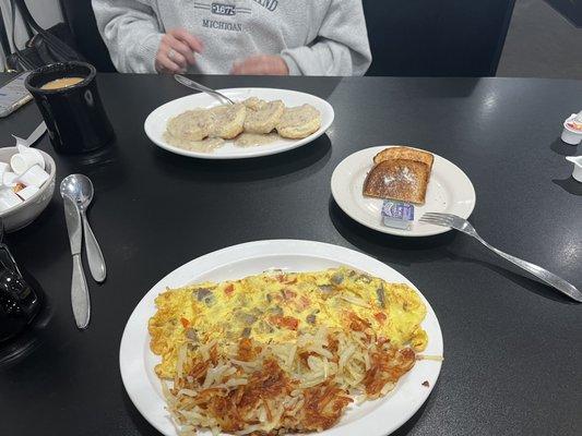 Greek omelette, sausage gravy and biscuits.