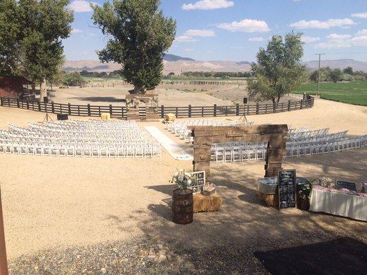 Fantastic outdoor wedding set with a rustic theme. Pallet archways, custom runner and complete event design by Event Source.