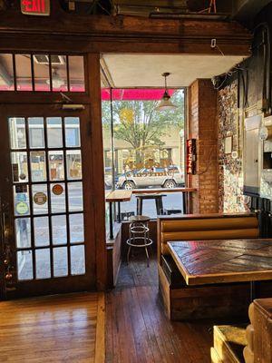 The door and window of the restaurant from inside.