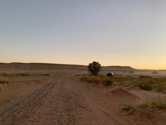 walking away from the water at sunset. so much room to camp and ride ATVs