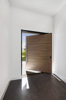 A bold statement of elegance and protection--full wood impact door.