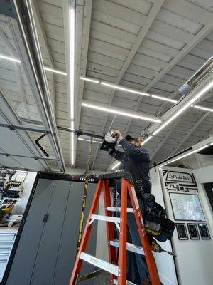 Eric from G&G garage door co. Installing new genie silent max garage door opener