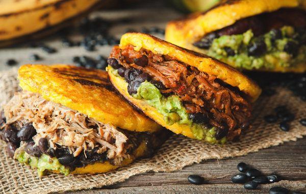 Sweet corn arepa with pulled pork or shredded beef