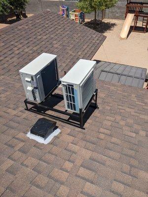 Two mini split roof top options with custom stand.