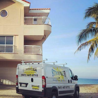 Delivery van visiting a client's home on Siesta Key, FL