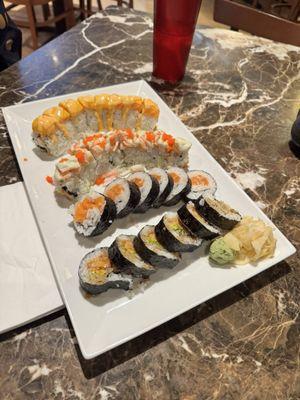 Salmon roll, Salmon and Mango Roll, Shrimp Tempura, and I can't remember the other one