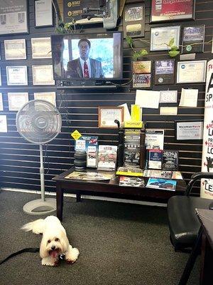 The waiting area was comfy with a TV