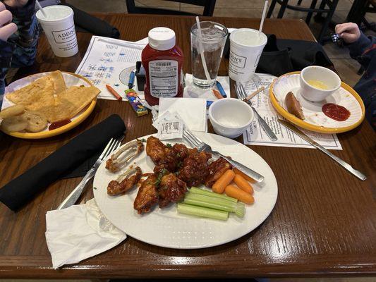 House BBQ wings, child's cheese quesadilla with smiley fries, child's corn dog with mandarin oranges.