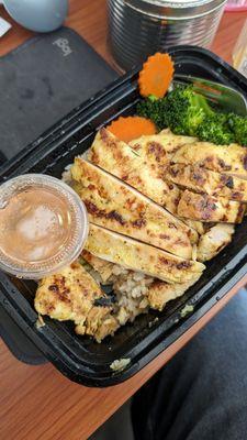 BBQ chicken over fried rice.