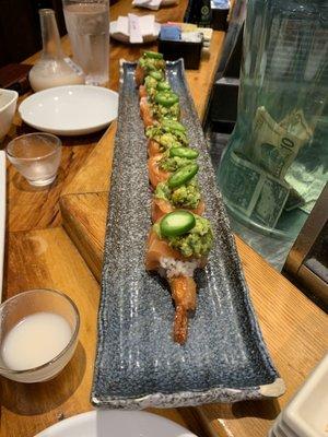 Treasure island roll. Fried shrimp, with salmon, guacamole and jalapeño