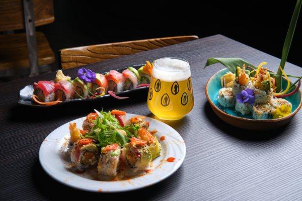 Various specialty sushi rolls with beer from Lost Tavern