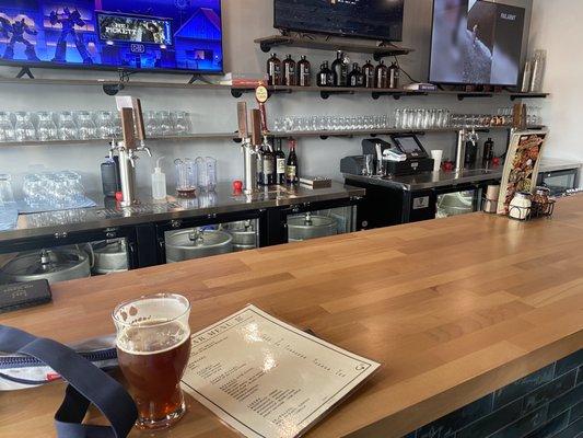 Bar area with beer brewed in house