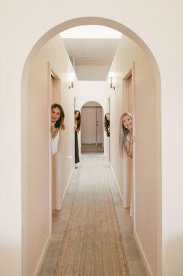 Hallway arches and team in the 4 private rooms