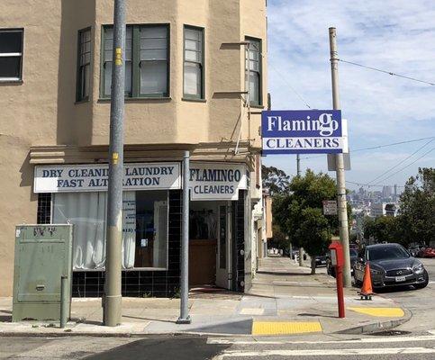 Outside the store, fancy new logo, with a nice view of downtown in the distance.