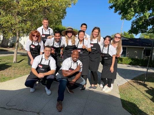 Our team serving up pizzas at one of our client appreciation events!