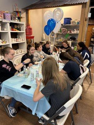 Birthday party pottery decorating