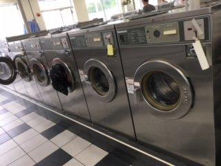 Spin City, Franklin Square, NY 5 broken washers in a row of 8 machines.