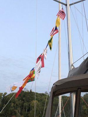 Sailing flags at anchorage.  Note the quarantine flag (solid yellow).  We didn't have Covid