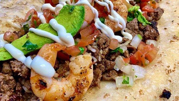 Inside our "BEST SELLER" Surf & Turf Burrito