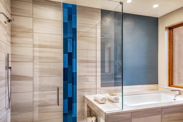 Frameless glass shower using 1/2" low iron glass for the most clarity.