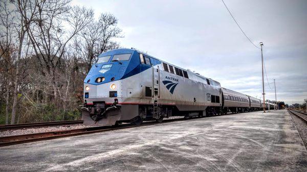 This picture with Amtrak is departing early on time.