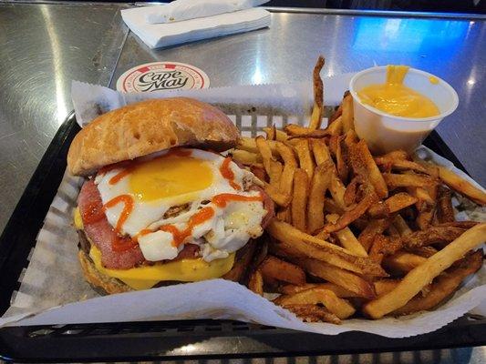 Good morning vietnam burger with pork roll and a fried egg. Crab fries on the side. Really good.