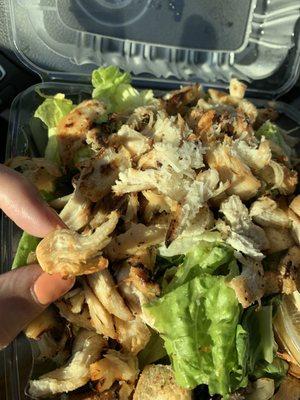 Dried out chicken in the Caesar salad.