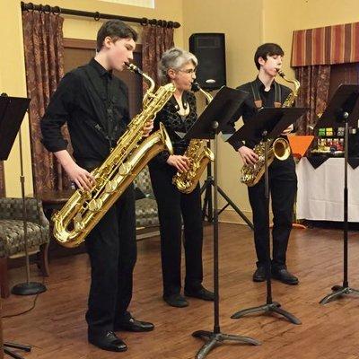 Paul, Mary Ellen and Julian perform "Maple Leaf Rag" for alto, tenor and baritone saxes