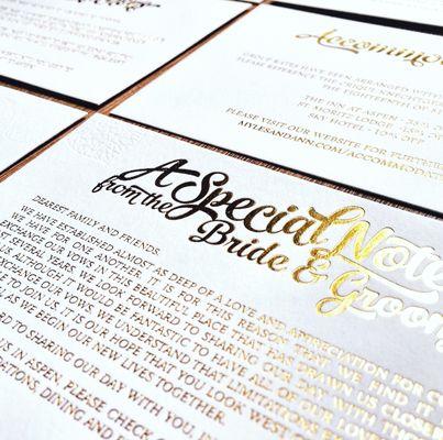 Luxe letterpress wedding invitation suite featuring custom lettering, gold foil stamp, and blind deboss