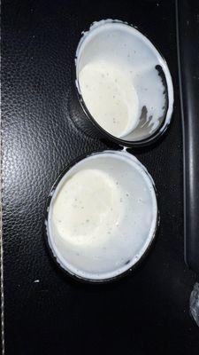 Two containers of ranch dressing for 24 wings. These aren't even 1/4 full.