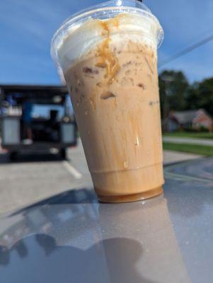 Iced toasted marshmallow latte with a squirt of caramel.