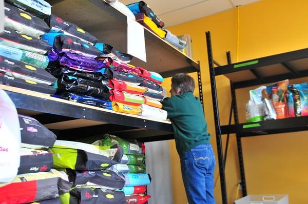 Community focused!  Here you see a HOPE food bank volunteer preparing for distribution day.